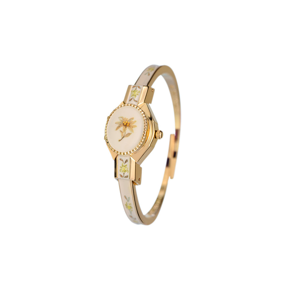 Swiss Made Edelweiss Gold White women’s watch with engraved Edelweiss flower, enamel case and 18K gold plated lid by André Mouche